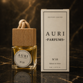 AURI No.10 alcohol-free car diffuser with white gift box on dark marble, inspired by Chanel Coco Mademoiselle