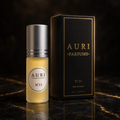 AURI No.11 alcohol-free roll-on perfume oil with black gift box on dark marble, inspired by Jean Paul Gaultier Scandal