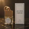 AURI No.12 alcohol-free car diffuser with white gift box on dark marble, inspired by Bvlgari Tygar