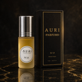 AURI No.15 alcohol-free roll-on perfume oil with black gift box on dark marble, inspired by Chanel Chance Eau Tendre