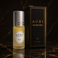 AURI No.4 alcohol-free roll-on perfume oil with black gift box on dark marble, inspired by Yves Saint Laurent Black Opium