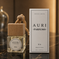 AURI No.6 alcohol-free car diffuser with white gift box on dark marble, inspired by Dior J'adore