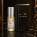 AURI No.7 alcohol-free roll-on perfume oil with black gift box on dark marble, inspired by Paco Rabanne 1 Million