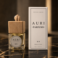 AURI No.9 alcohol-free car diffuser with white gift box on dark marble, inspired by Maison Francis Kurkdjian Baccarat Rouge 540