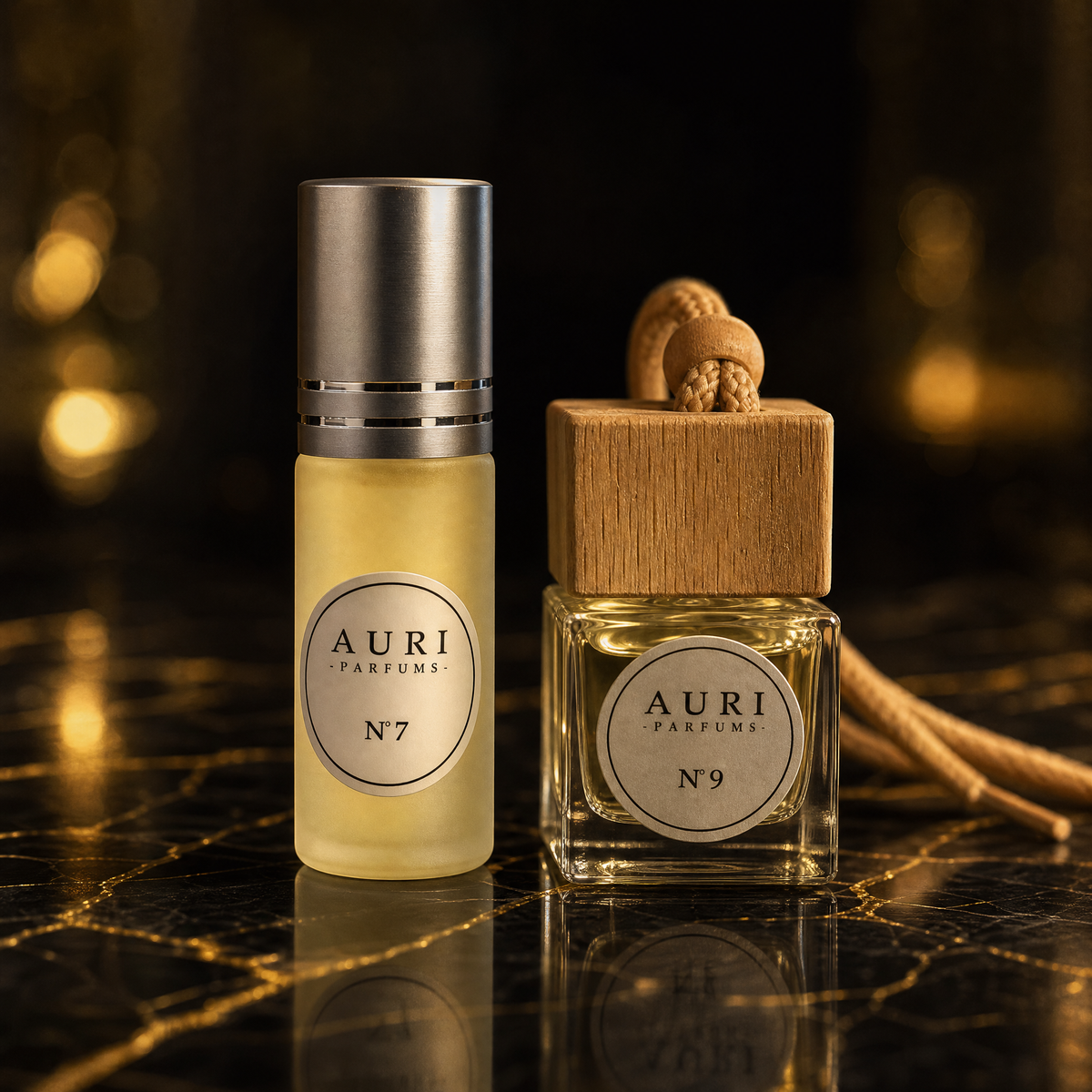 AURI N°7 roll-on perfume oil and N°9 car diffuser together on dark gold-veined marble